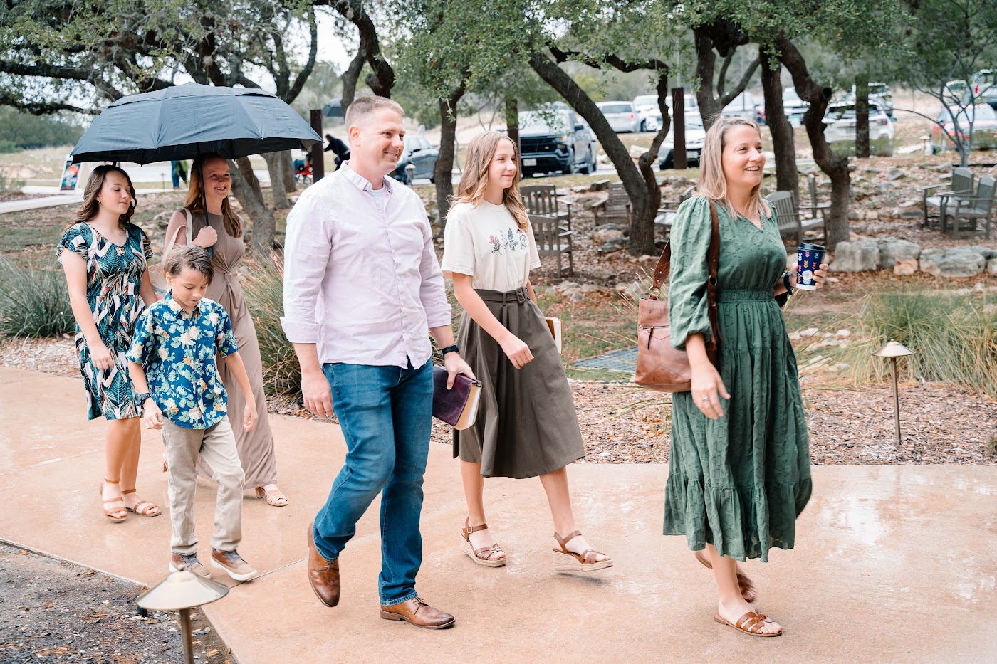 Family of several generations walking into Christ Community Church